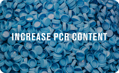 A pile of blue bottle caps with the text 'INCREASE PCR CONTENT' prominently displayed.