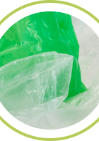 Close-up of green and clear plastic materials, representing sustainable packaging efforts.