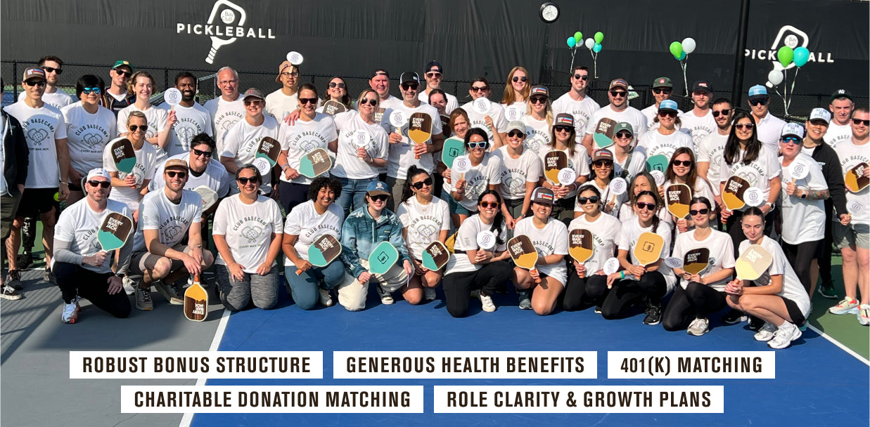 Group photo of employees participating in a pickleball event, showcasing teamwork and community spirit.