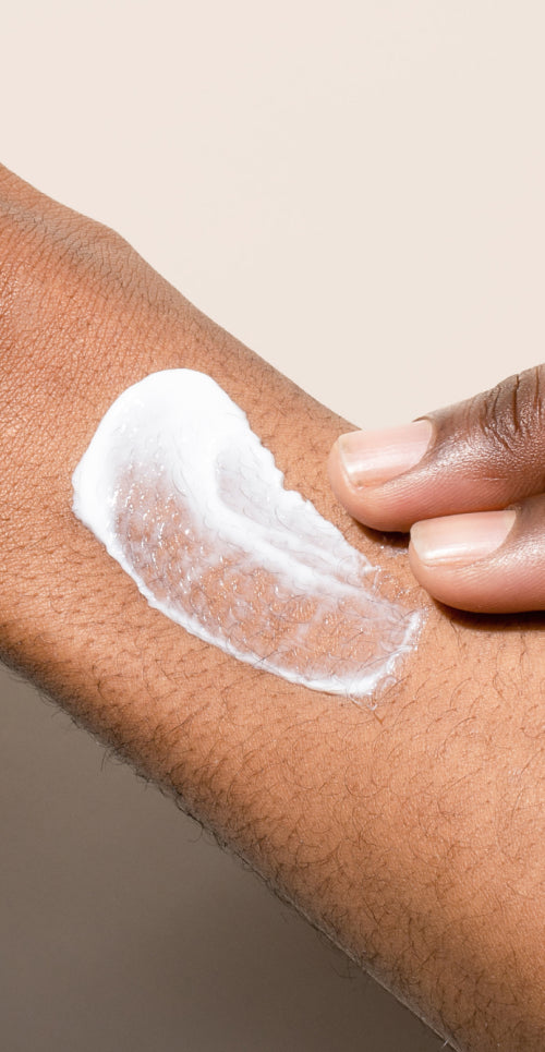 Every Man Jack Model applying lotion