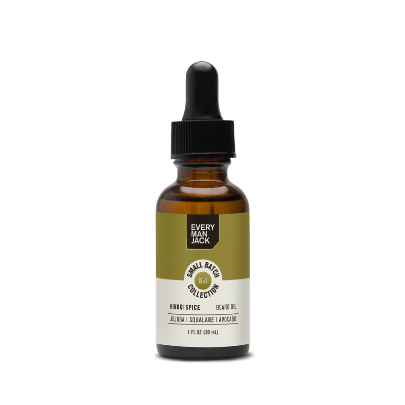 Front view of Small Batch Beard Oil dropper bottle showcasing the Hinoki Spice label on a black background