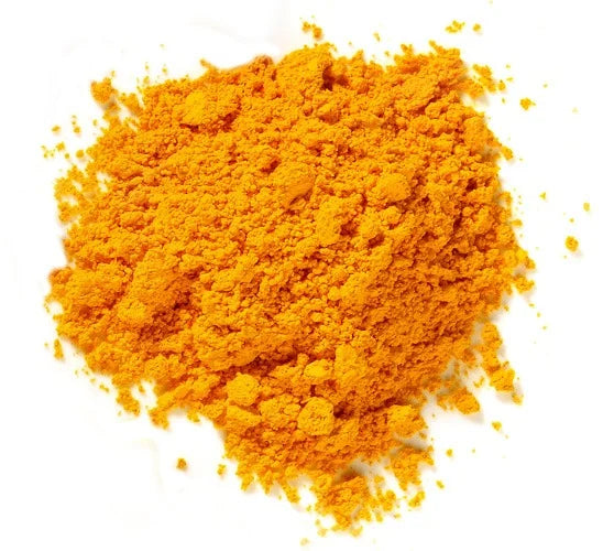 Top-down view of Panthenol powder showing vibrant golden-yellow fine powder on white background