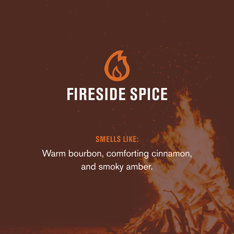 FIRESIDE SPICE — SMELLS LIKE: Warm bourbon, comforting cinnamon, and smoky amber. Flame icon and campfire image.