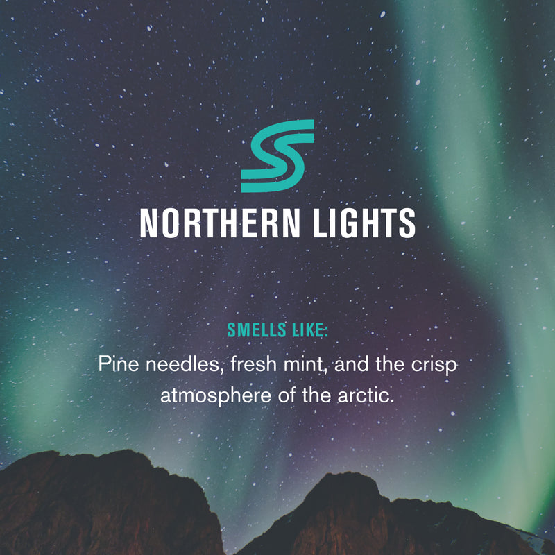 S logo above 'NORTHERN LIGHTS' and text 'SMELLS LIKE: Pine needles, fresh mint, and the crisp atmosphere of the arctic.'