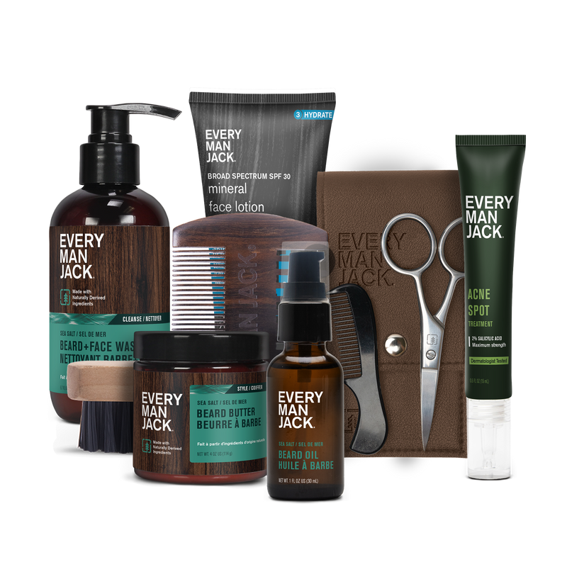 Every Man Jack Deluxe Beard + Face Bundle including beard wash, oil, butter, tools, and SPF lotion, all with Sea Salt scent.